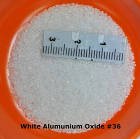 agen distributor pasir sandblasting jakarta indonesia White allumunium oxide fused WAO mesh # 8 10 12 14 16 20 24 30 36 40 46 60 80 90 100 120 150 180 220 240 320 400 500